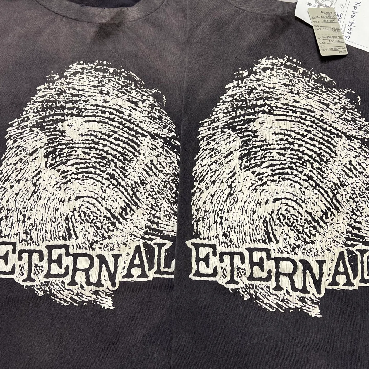 Comparison of printing proofs SAINT Mxxxxxx CHOSEN SS TEE/BLK Burst pattern/fingerprint printing Chosen Tee Washed black S-XL Look for cylindrical fabrics without side seams. Don’t buy open width fabrics anymore. It’s boring. Assute garment dyeing. The whole piece is sprayed with horse-hair spray. Re-spray the heavy parts to fade. The collar and cuffs are frayed. Many hangings are worn. Original consistent main mark/wash mark/with little angel anti-counterfeiting label